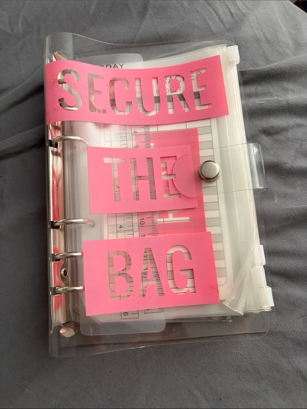 Clear Snap Closure Binder with Pink "SECURE THE BAG" Panels